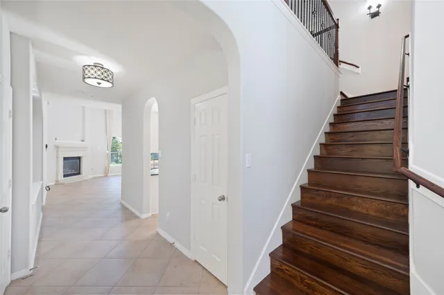 a view of an entryway with wooden floor