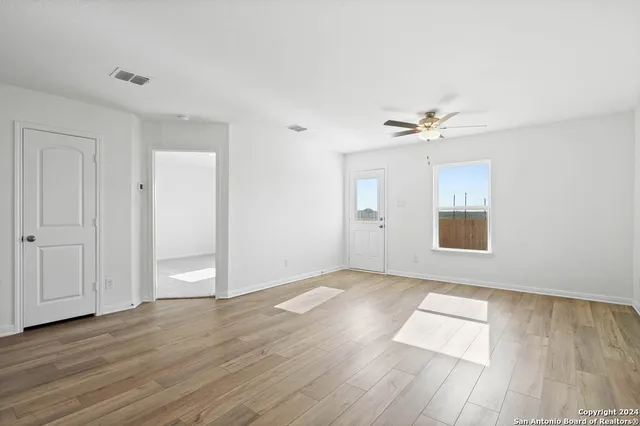 a kitchen with stainless steel appliances granite countertop a sink stove and microwave