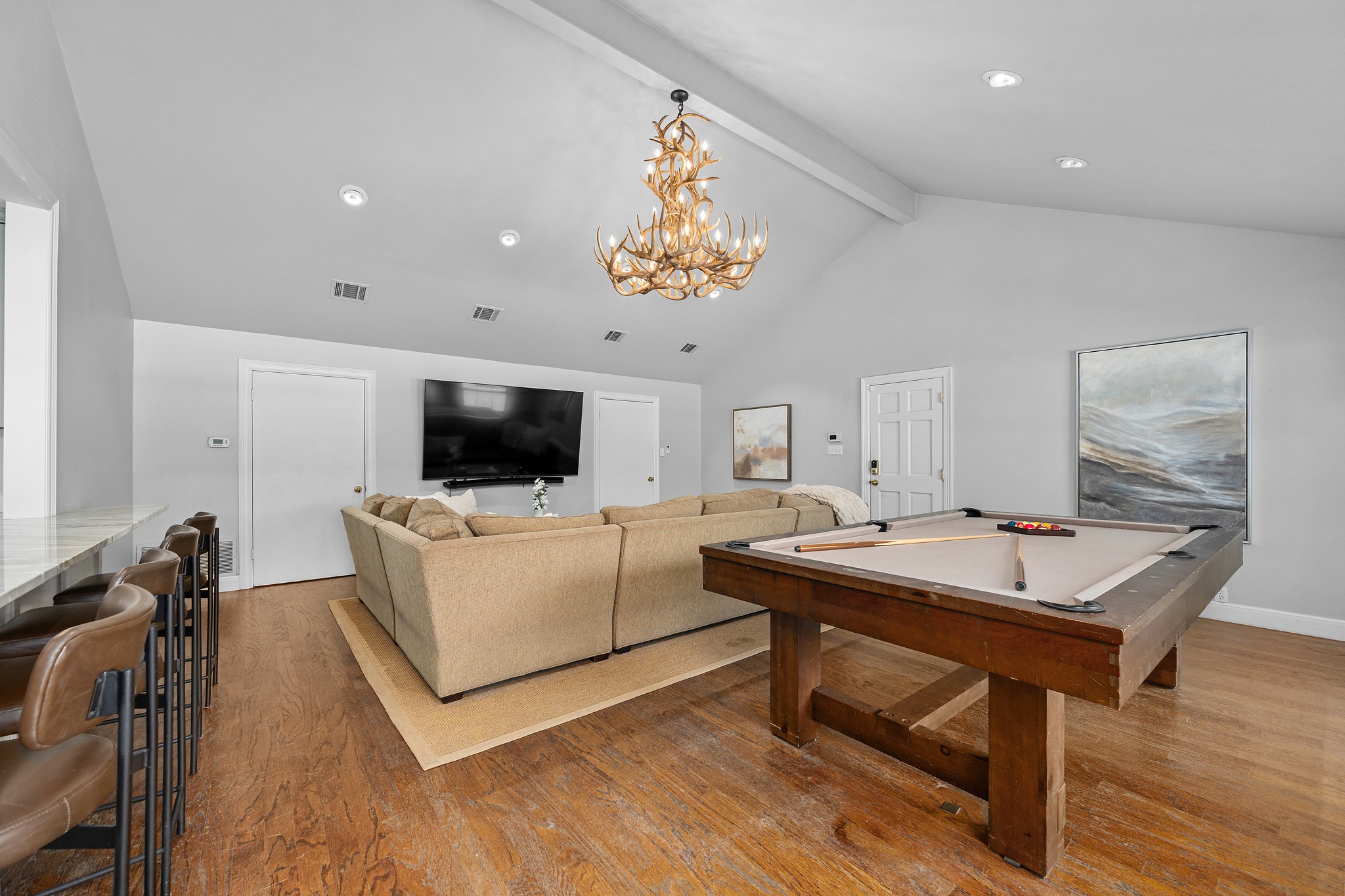3100 Pecos Street Austin, TX 78703 - Photo 18 of 38 a living room with furniture and a flat screen tv