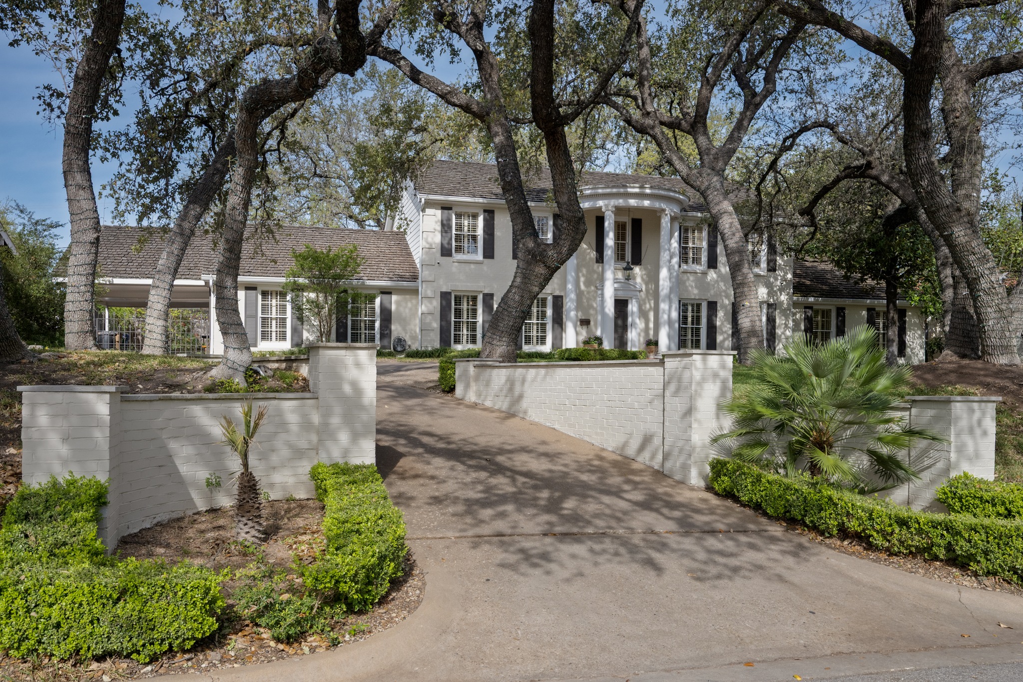 3100 Pecos Street Austin, TX 78703 - Photo 2 of 38 a view of a street with houses on both side