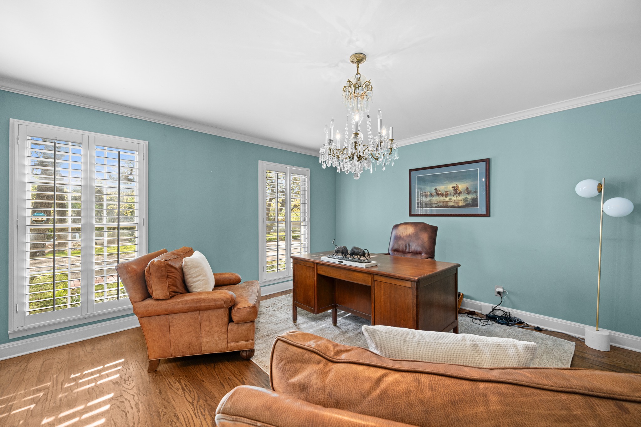 3100 Pecos Street Austin, TX 78703 - Photo 25 of 38 a living room with furniture and a chandelier