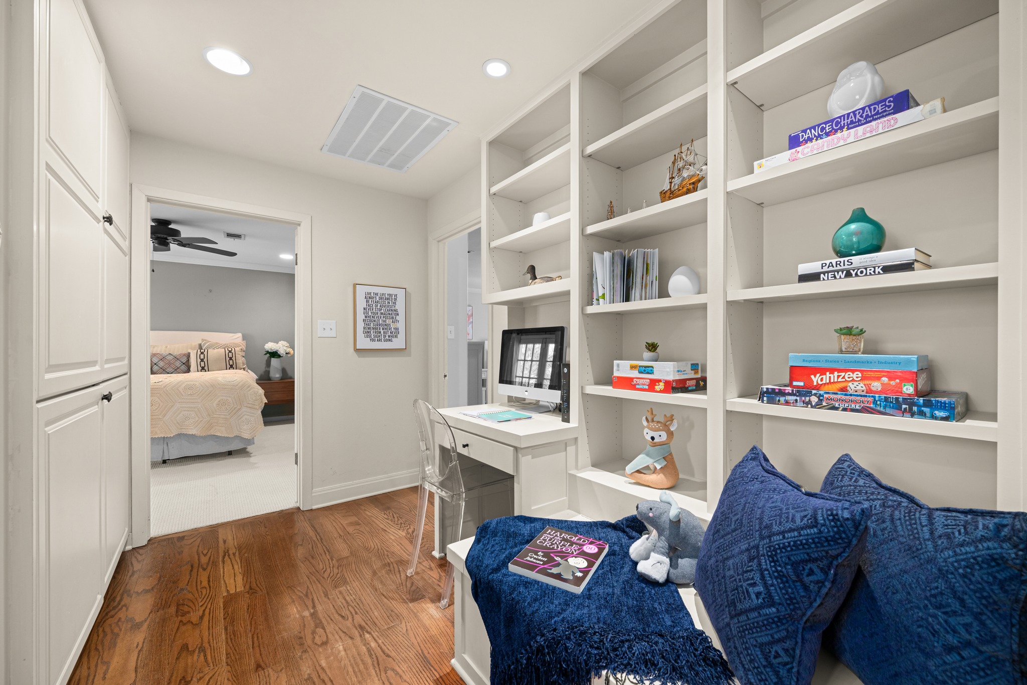 3100 Pecos Street Austin, TX 78703 - Photo 27 of 38 a living room with furniture and a wooden floor