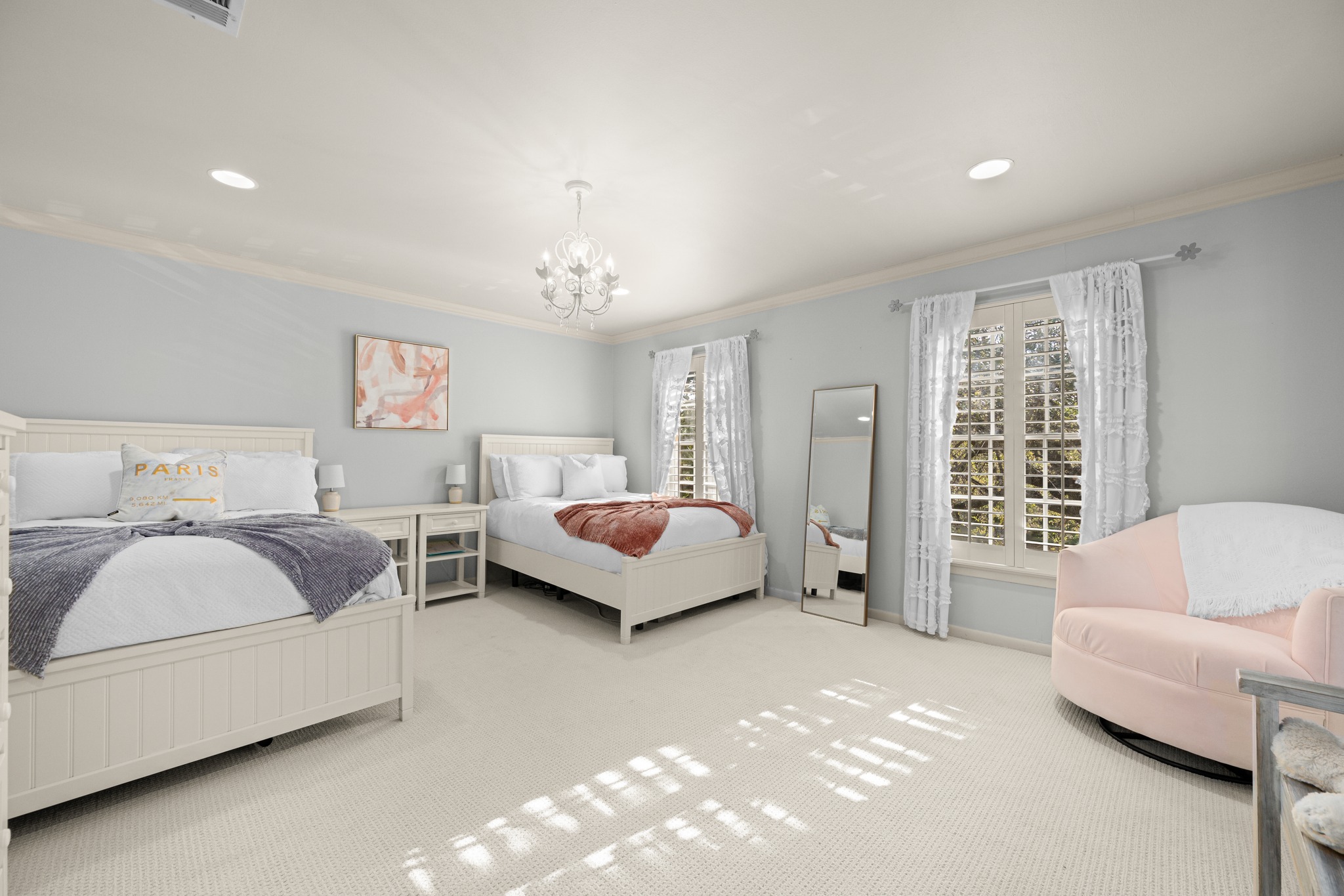 3100 Pecos Street Austin, TX 78703 - Photo 28 of 38 a spacious bedroom with a bed and a couch