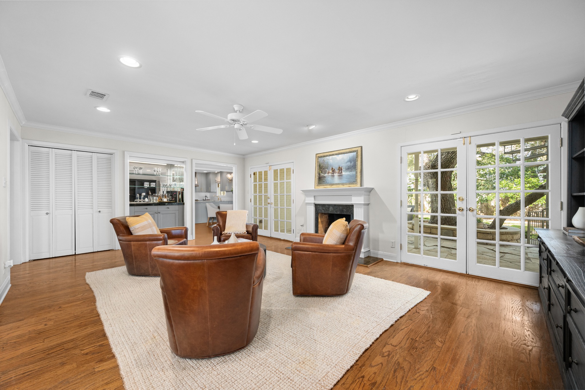 3100 Pecos Street Austin, TX 78703 - Photo 8 of 38 a living room with furniture a large window and wooden floor