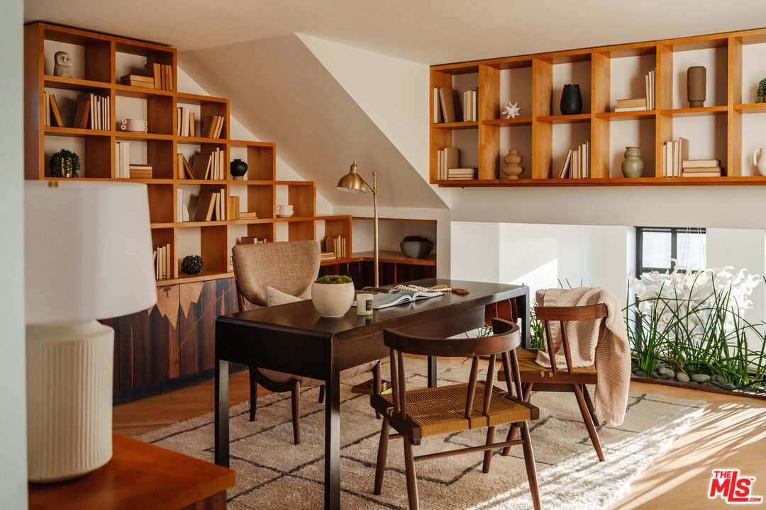 4 Yawl Street Marina del Rey, CA 90292 - Photo 16 of 34 a view of a dining room with furniture and wooden floor