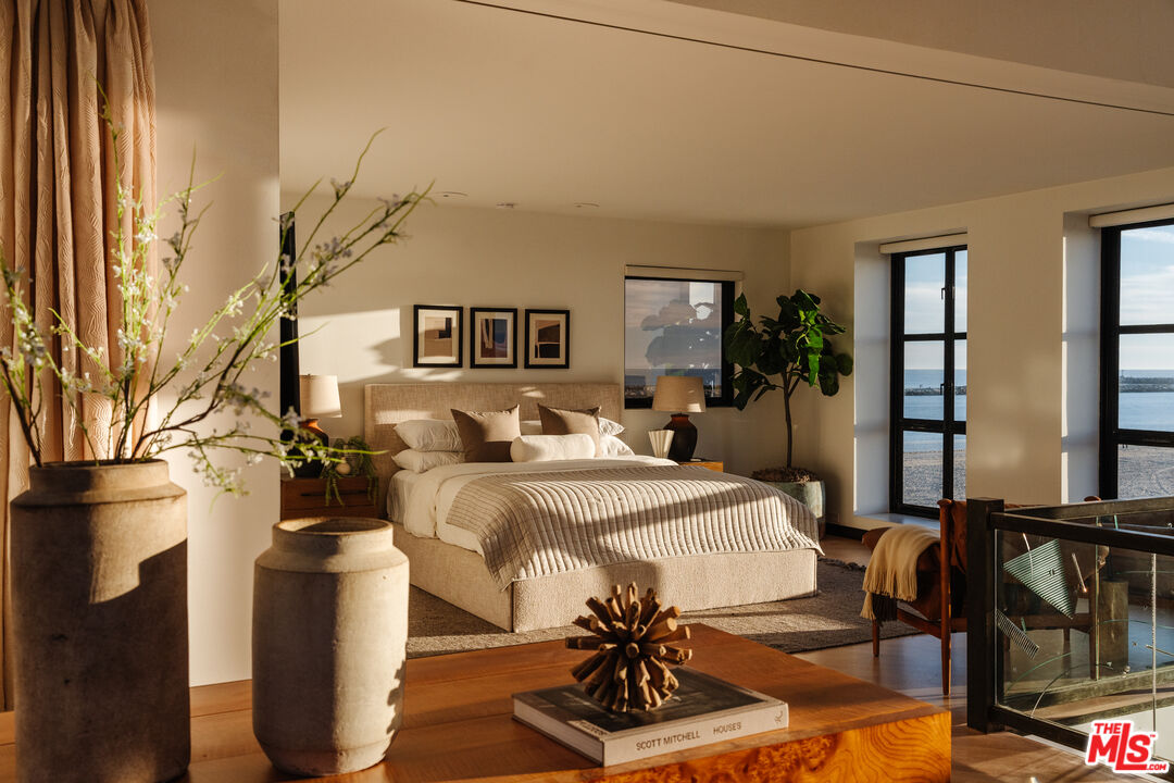 4 Yawl Street Marina del Rey, CA 90292 - Photo 18 of 34 a living room with furniture a flat screen tv and a table