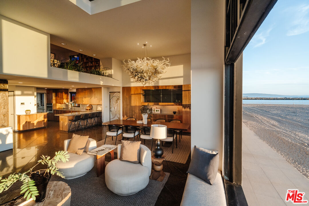 4 Yawl Street Marina del Rey, CA 90292 - Photo 2 of 34 a living room with lots of furniture and a large window