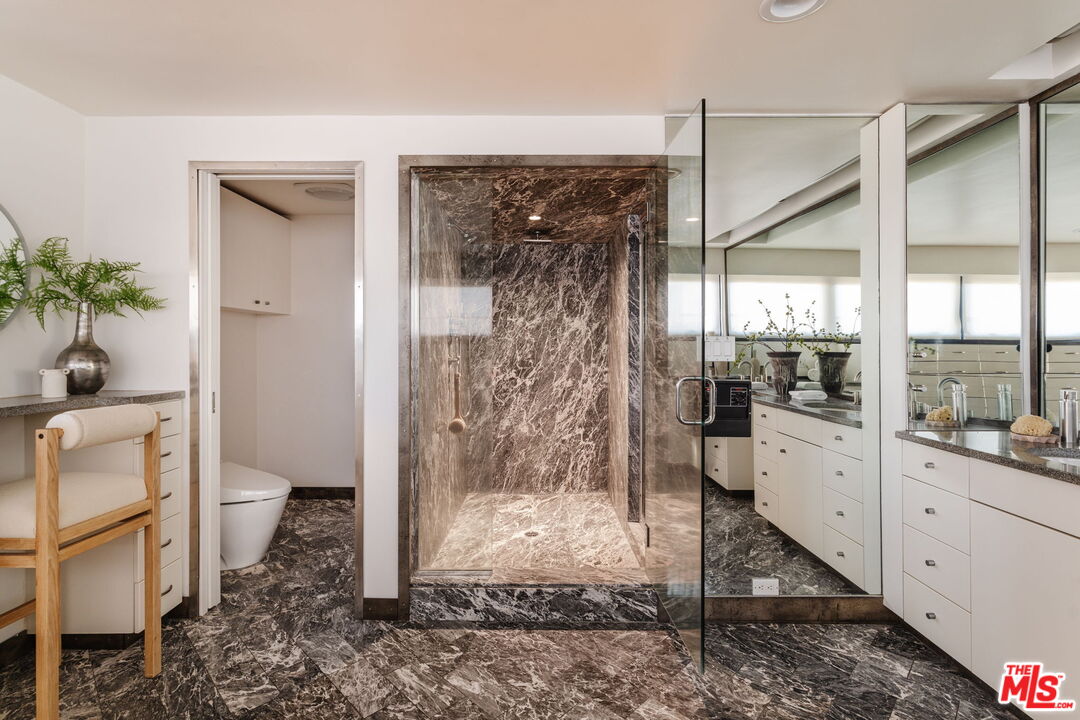 4 Yawl Street Marina del Rey, CA 90292 - Photo 21 of 34 a bathroom with a granite countertop sink a toilet and shower