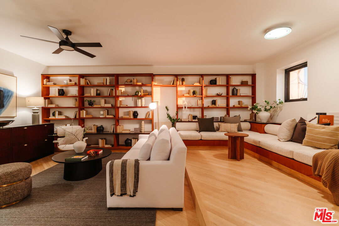 4 Yawl Street Marina del Rey, CA 90292 - Photo 27 of 34 a living room with furniture and a floor to ceiling window