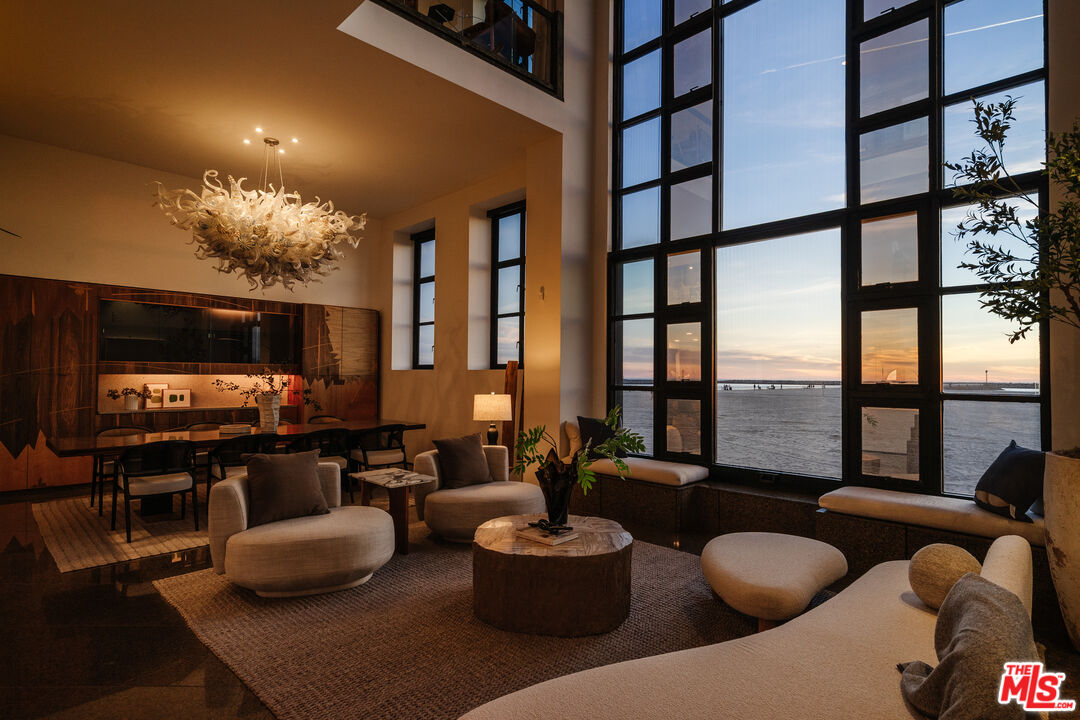 4 Yawl Street Marina del Rey, CA 90292 - Photo 6 of 34 a living room with furniture and a flat screen tv