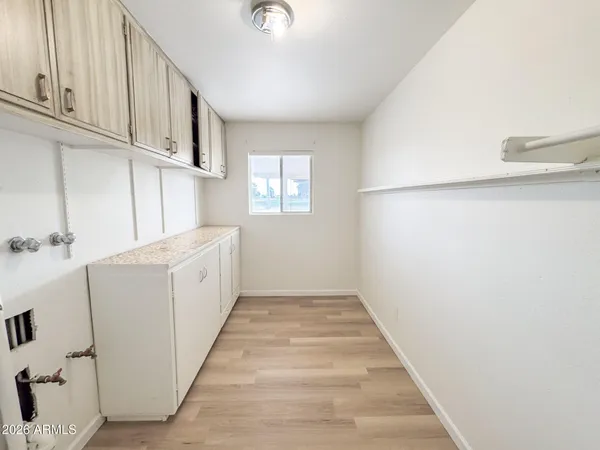 a view of a hallway with closet
