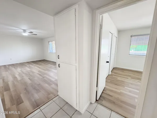 a view of entryway with wooden floor