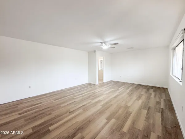 a view of a bathroom from a hallway