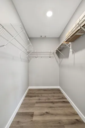 a view of a room with racks on the wall