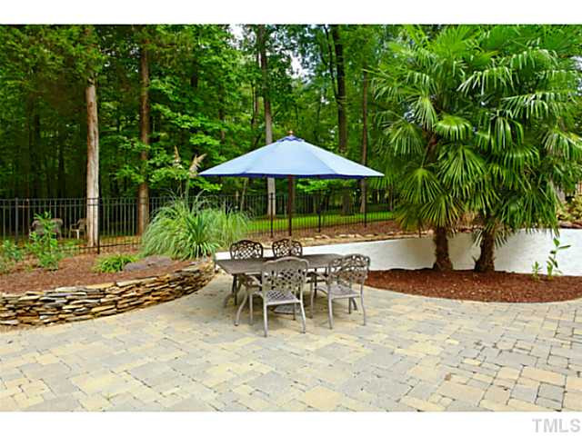 5504 Shimer Farm Lane Raleigh, NC 27614 - Photo 23 of 25 a view of a backyard with furniture and a garden