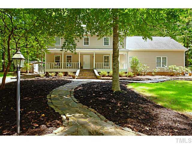 5504 Shimer Farm Lane Raleigh, NC 27614 - Photo 25 of 25 a front view of a house with garden