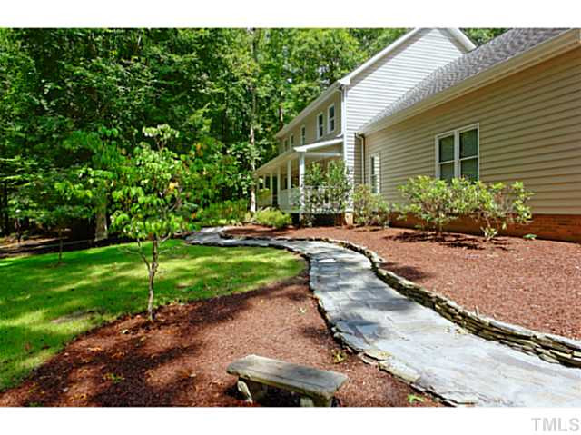 5504 Shimer Farm Lane Raleigh, NC 27614 - Photo 3 of 25 a front view of a house with a yard