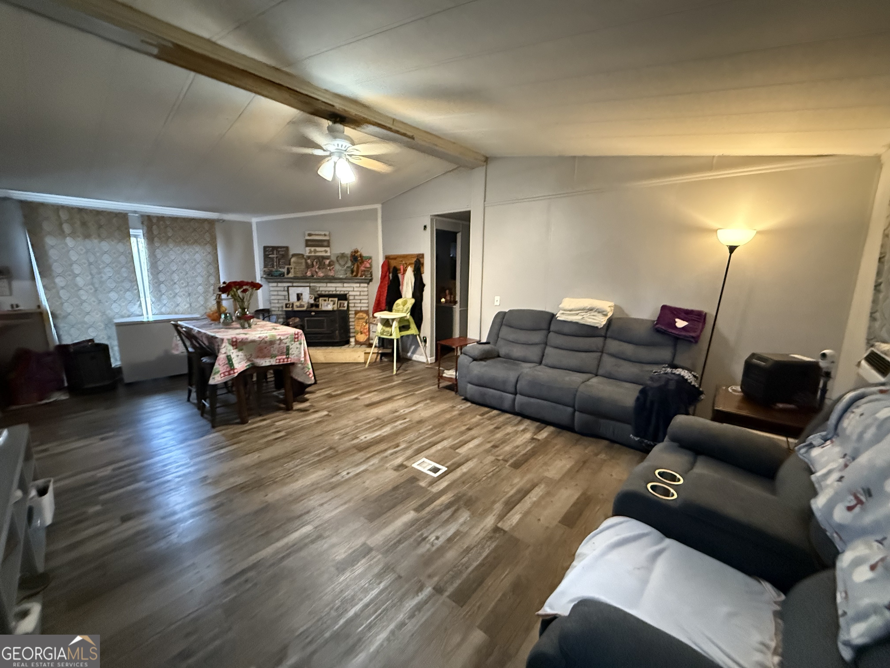 1775-1779 Payne Road Rentz, GA 31075 - Photo 11 of 51 a living room with furniture and a wooden floor