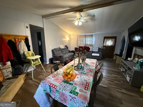 a view of a dining room with furniture