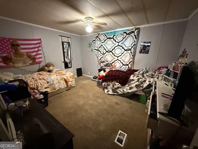 a bed room with a bed and a couch