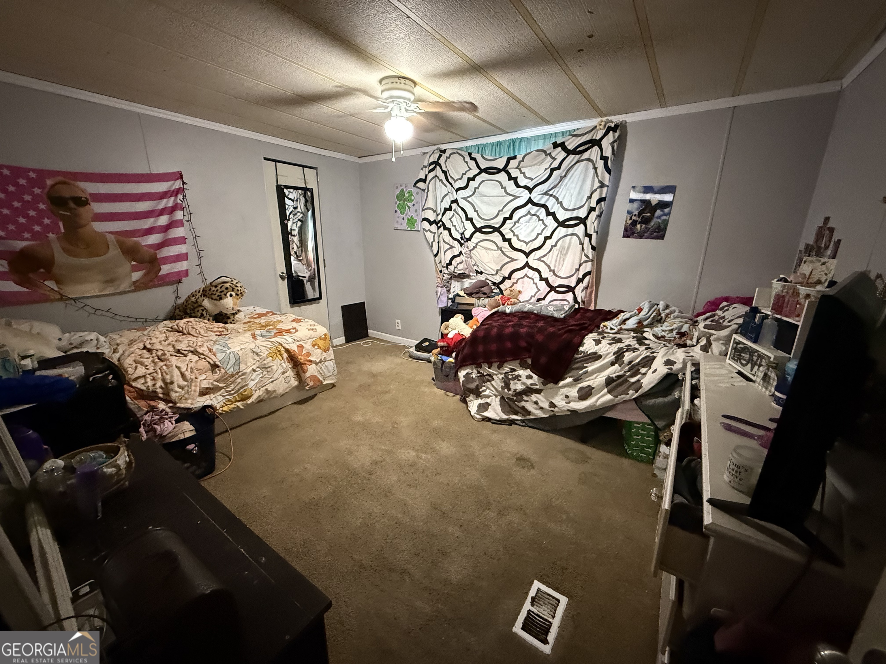 1775-1779 Payne Road Rentz, GA 31075 - Photo 26 of 51 a bed room with a bed and a couch