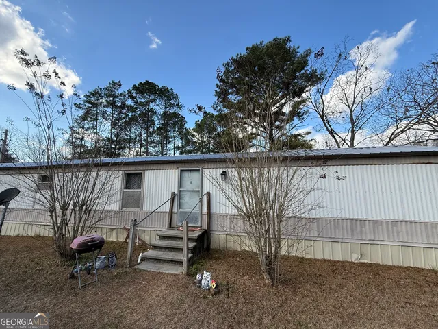 a house view with a garden space