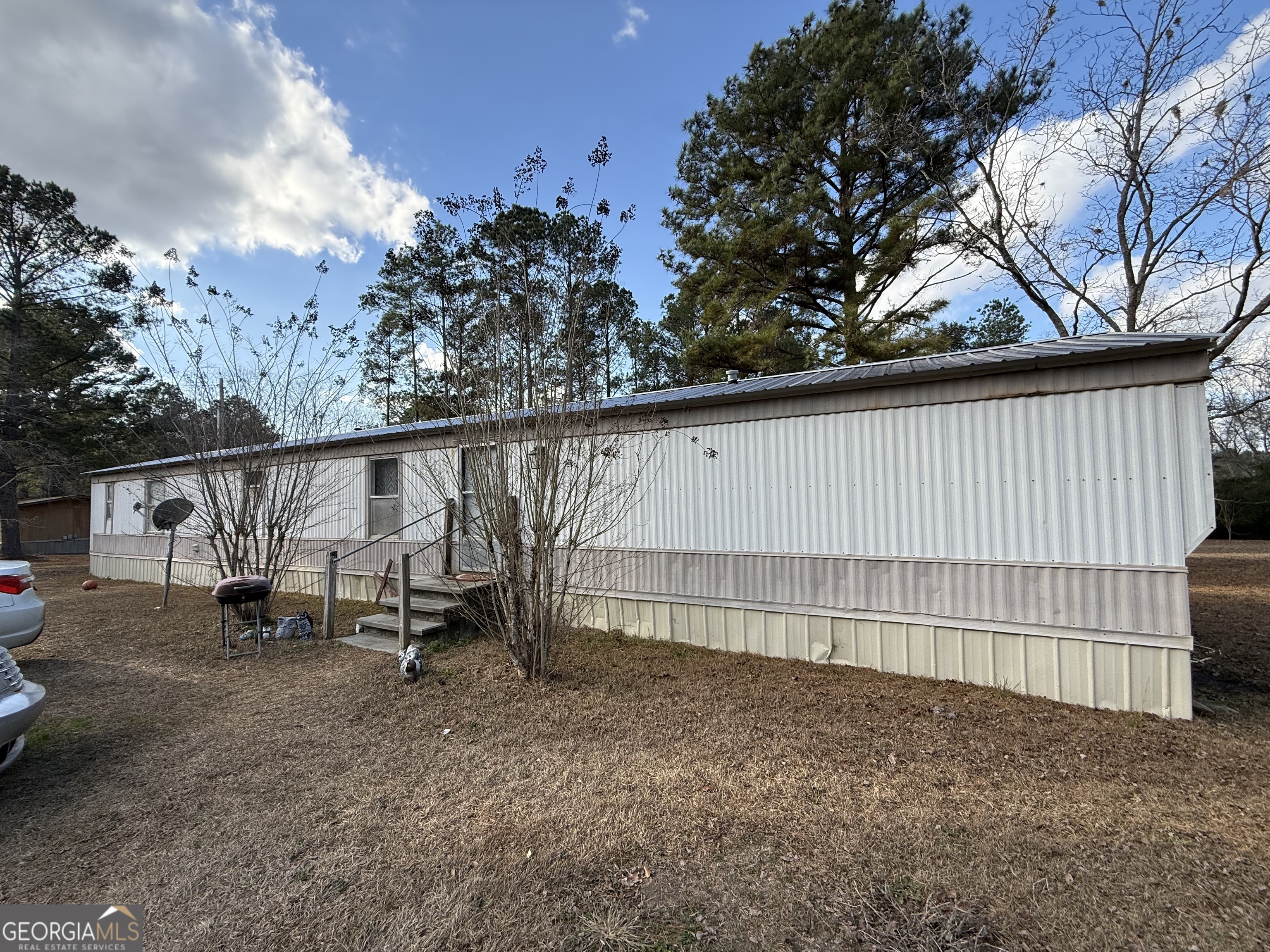 1775-1779 Payne Road Rentz, GA 31075 - Photo 38 of 51 a view of backyard and car parked