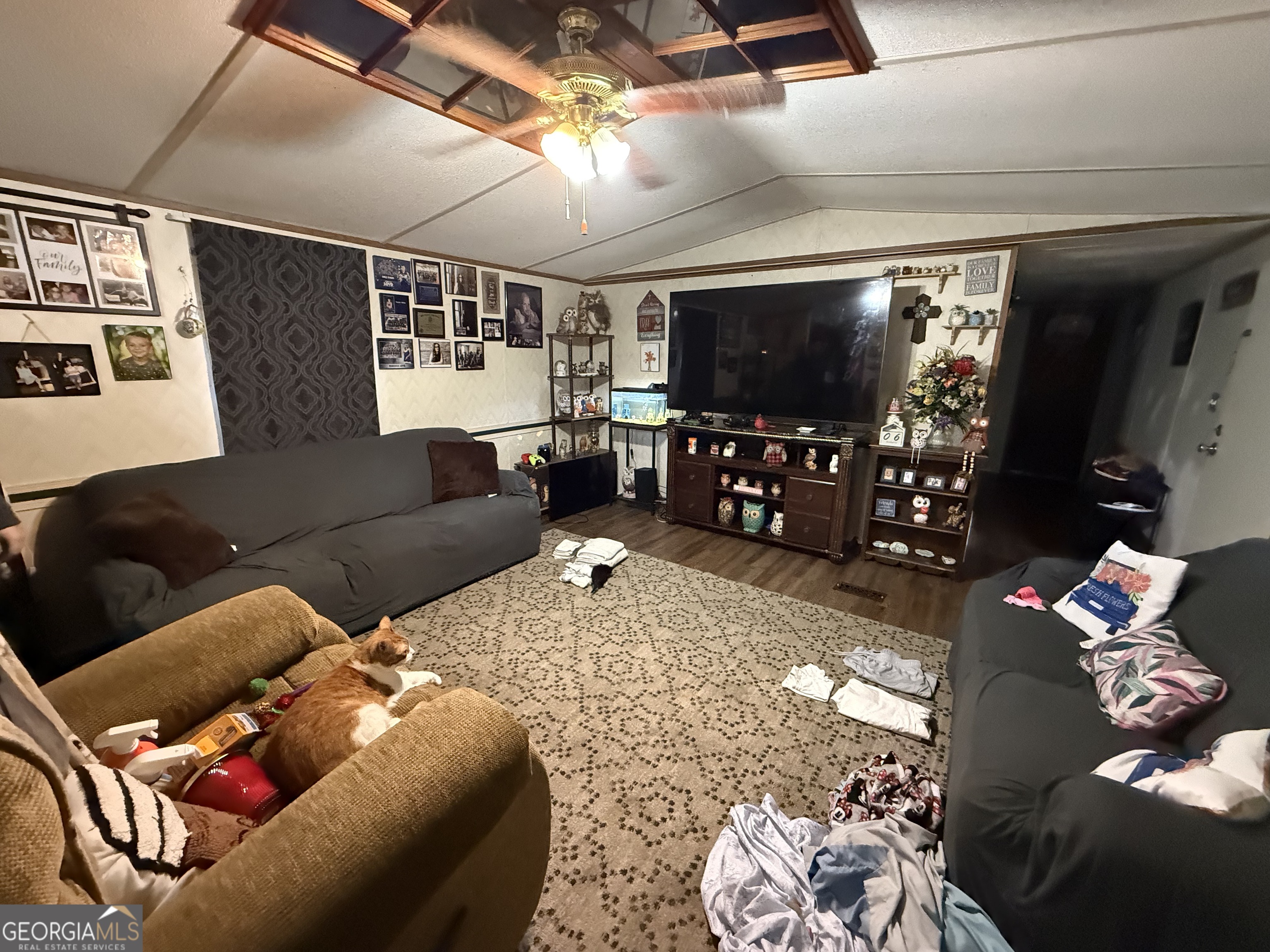 1775-1779 Payne Road Rentz, GA 31075 - Photo 41 of 51 a living room with furniture and a flat screen tv