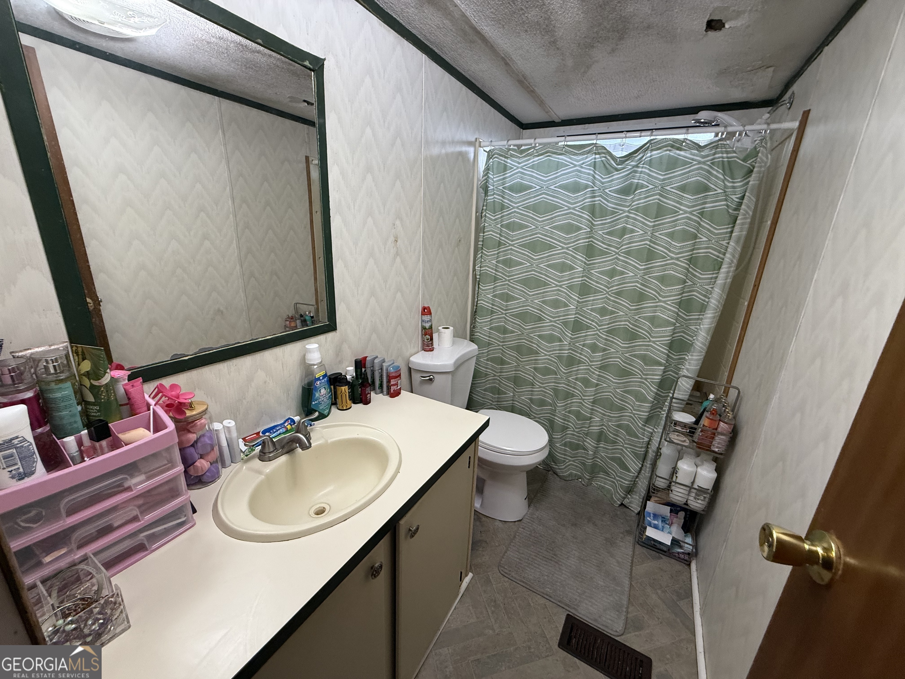1775-1779 Payne Road Rentz, GA 31075 - Photo 45 of 51 a bathroom with a sink toilet and shower