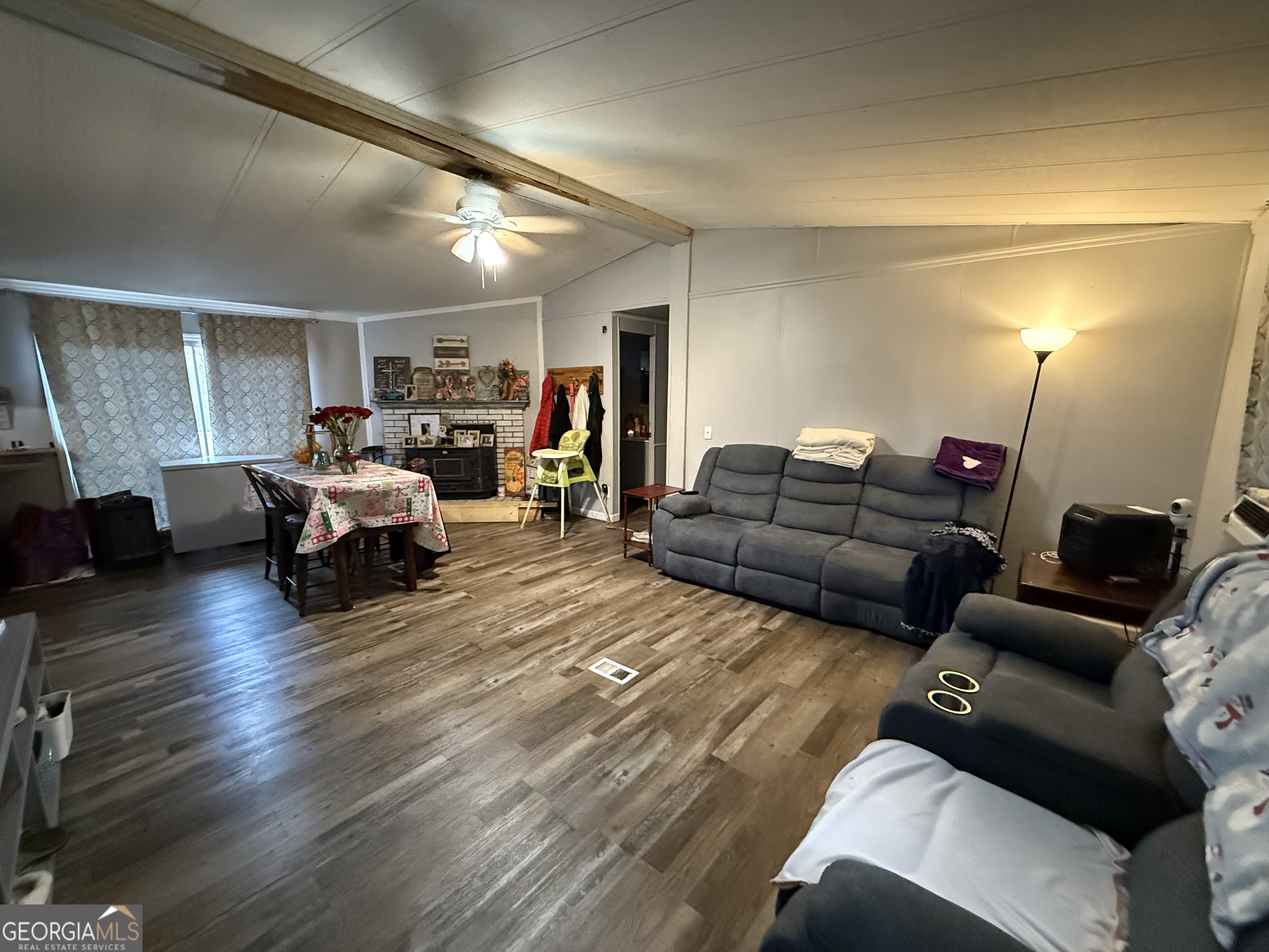1775-1779 Payne Road Rentz, GA 31075 - Photo 10 of 51 a living room with furniture and a wooden floor