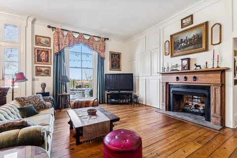 a kitchen with stainless steel appliances granite countertop a stove sink and cabinets
