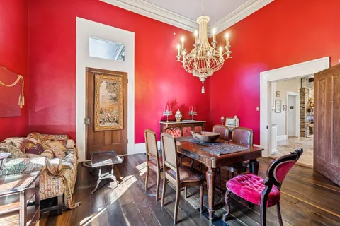 a swimming pool with outdoor seating and yard