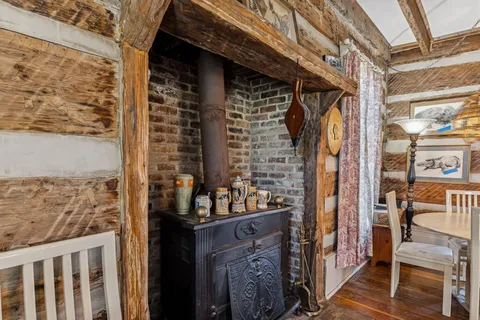 a view of a swimming pool with a yard and plants