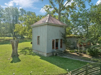 a view of a backyard with a garden