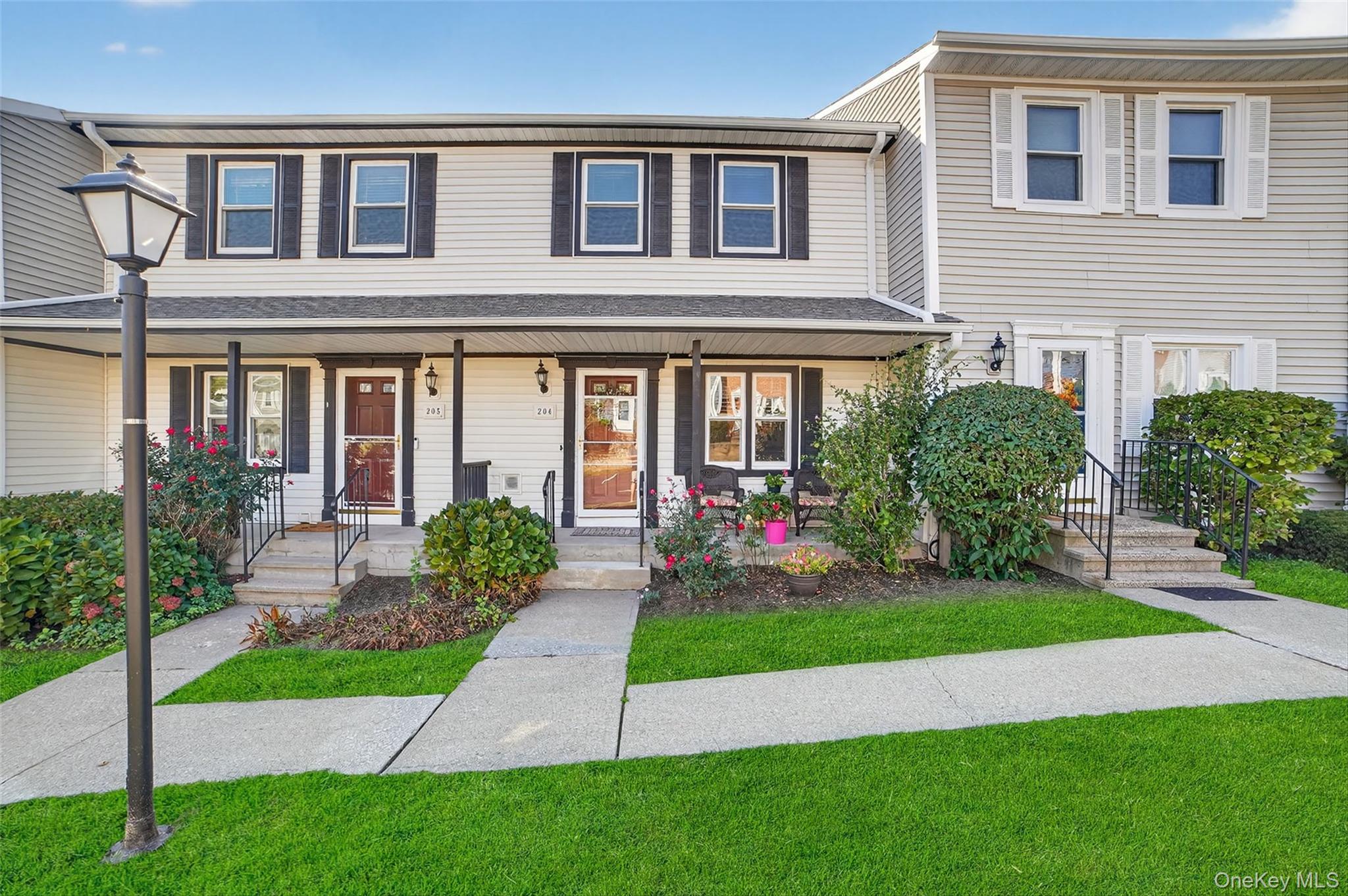 Tri-level condo with a covered porch