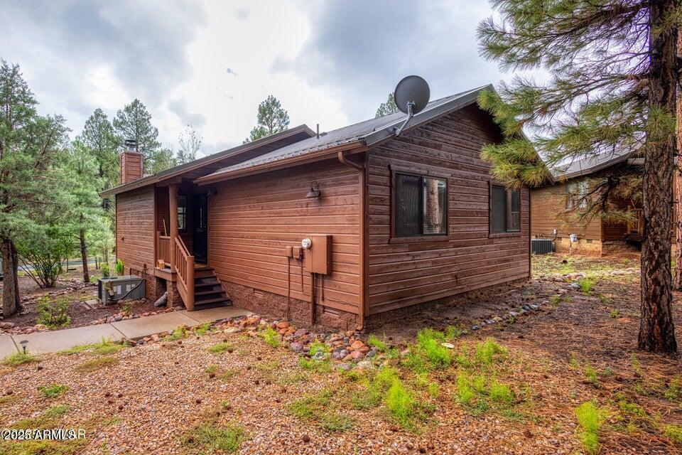 4800 West Tatanka Loop Show Low, AZ 85901 - Photo 22 of 36 a view of a house with a yard