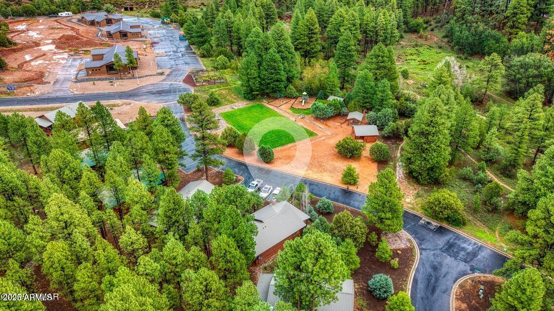 4800 West Tatanka Loop Show Low, AZ 85901 - Photo 30 of 36 an aerial view of a house with a yard