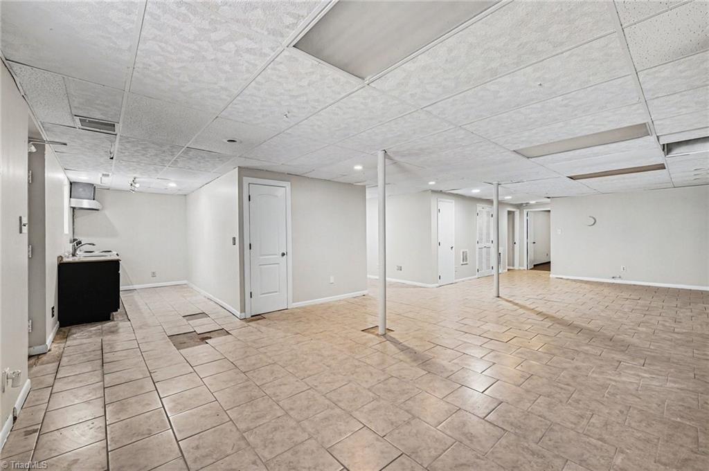 5830 Butler Road Gibsonville, NC 27249 - Photo 19 of 37 Basement Den & Kitchenette