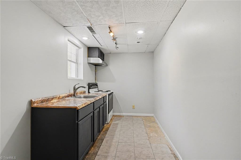 5830 Butler Road Gibsonville, NC 27249 - Photo 20 of 37 Basement kitchenette