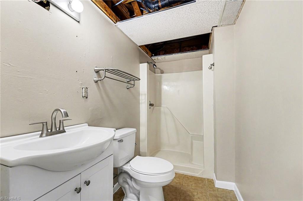 5830 Butler Road Gibsonville, NC 27249 - Photo 26 of 37 Basement Bathroom