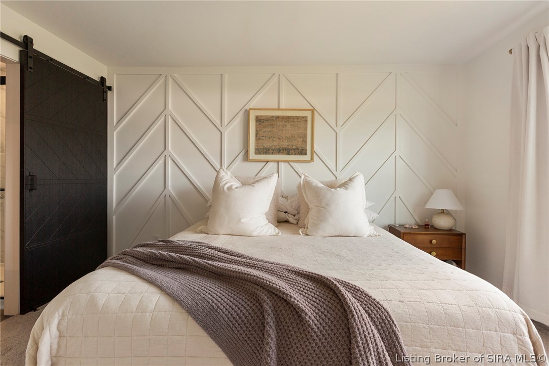 2411 Johnson Pass Memphis, IN 47143 - Photo 23 of 56 Primary bedroom with accent wall
