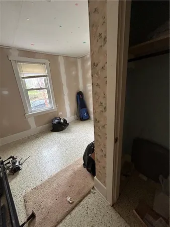 a view of a livingroom with closet and window