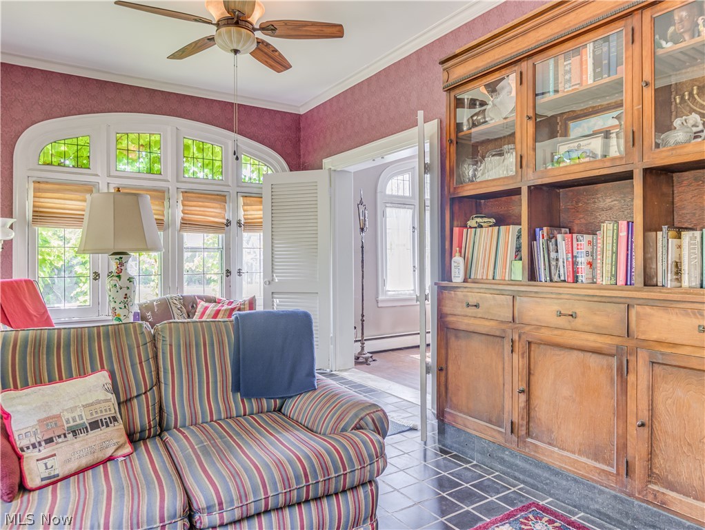 1330 Fulton Road Northwest Canton, OH 44703 - Photo 9 of 35 Sunroom. Bookcase stays.