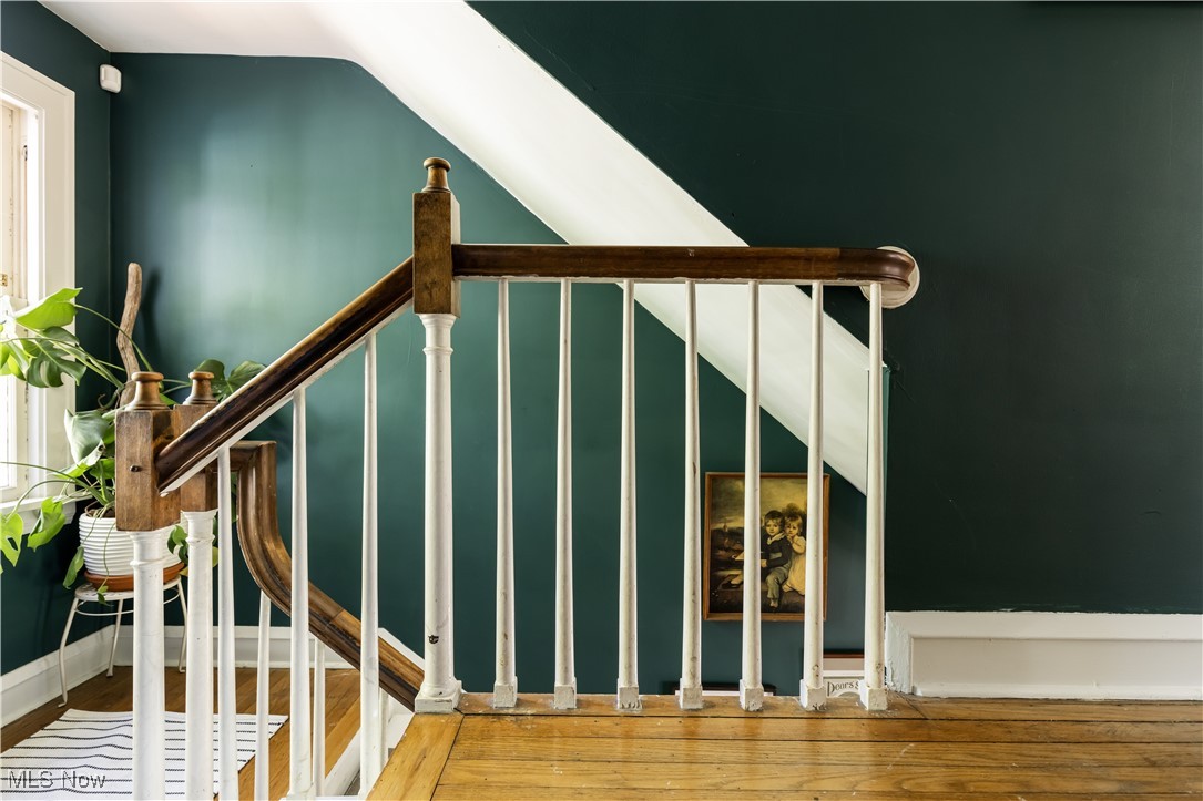 2671 Haddam Road Cleveland, OH 44120 - Photo 18 of 34 Stairway with lofted ceiling and wood finished floors