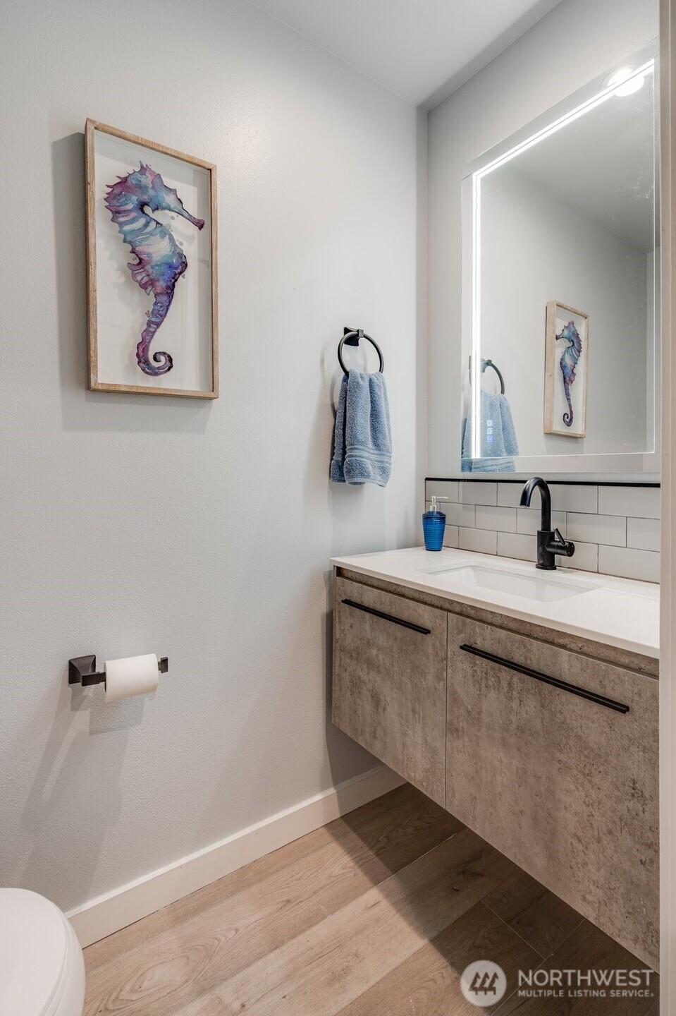 5341 South Bercot Road Freeland, WA 98249 - Photo 19 of 37 a bathroom with a sink and a mirror