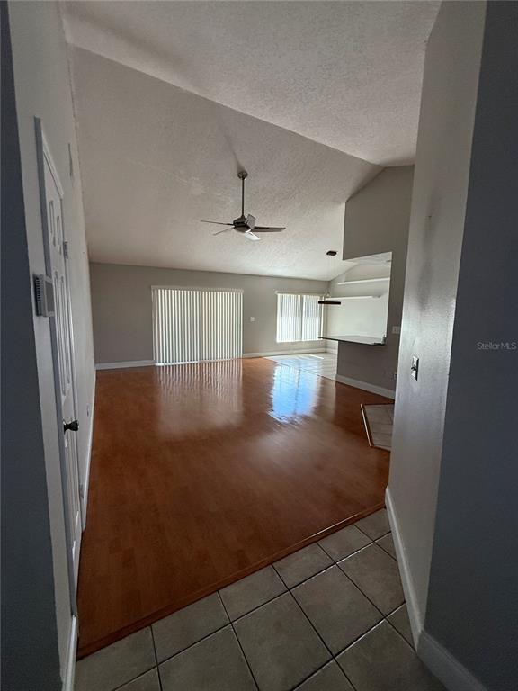 2075 Shadow Pine Drive Brandon, FL 33511 - Photo 20 of 57 a view of livingroom with hardwood floor and a ceiling fan