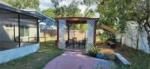 a view of a house with backyard