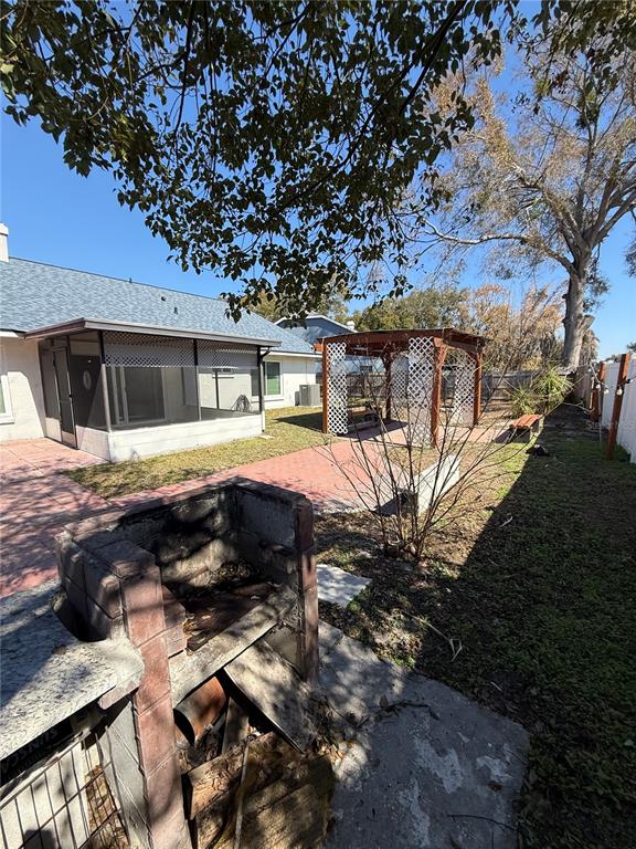 2075 Shadow Pine Drive Brandon, FL 33511 - Photo 46 of 57 a view of a house with backyard and sitting area