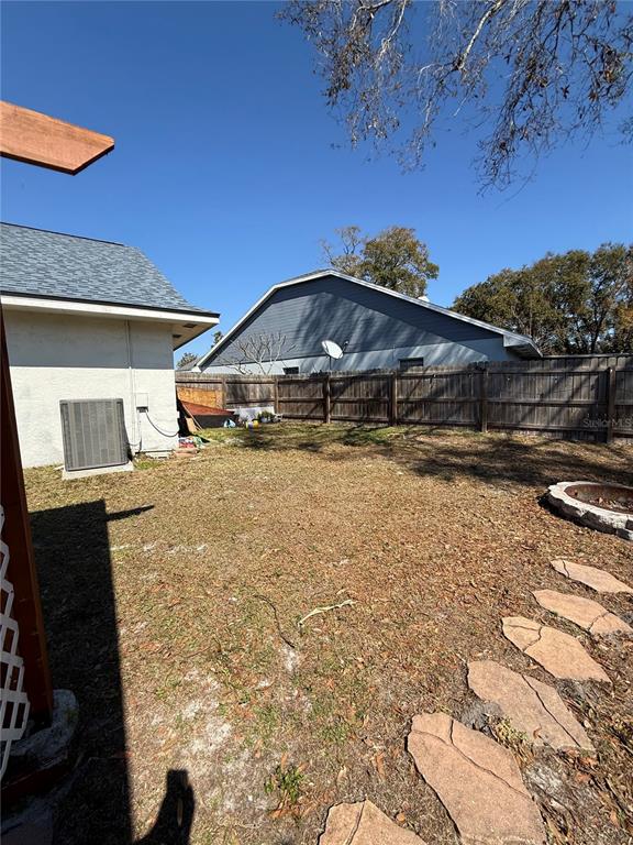2075 Shadow Pine Drive Brandon, FL 33511 - Photo 50 of 57 a front view of a house with a yard