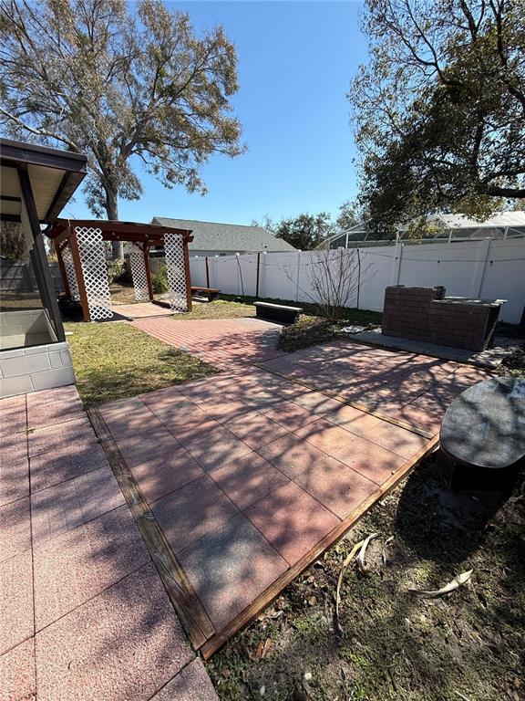 2075 Shadow Pine Drive Brandon, FL 33511 - Photo 53 of 57 a view of a backyard with trees